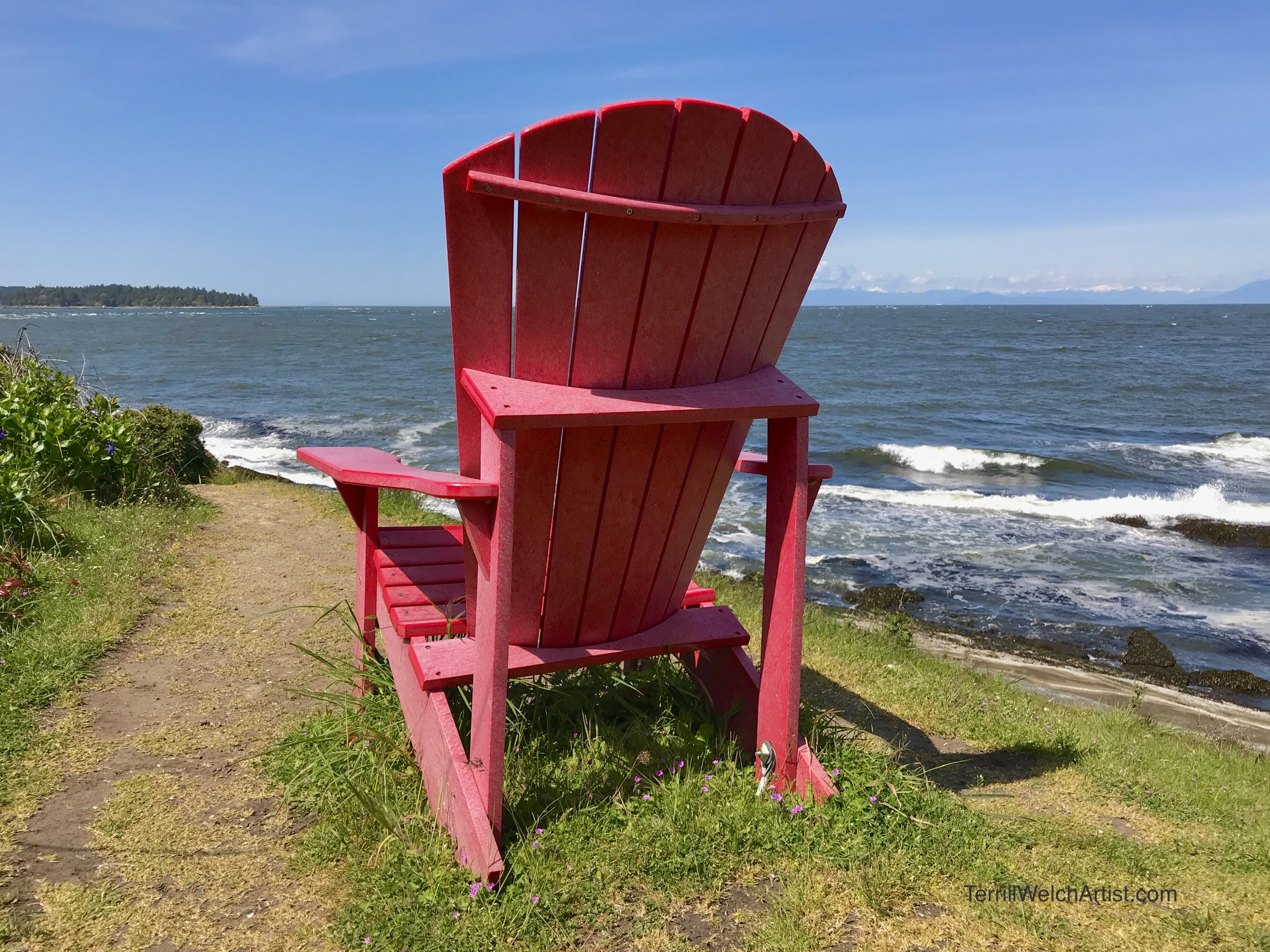 Red Chair over looking ocean.